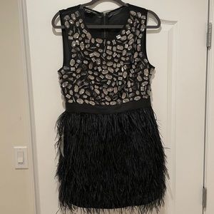 NEW WITH TAGS Bebe feather mini dress